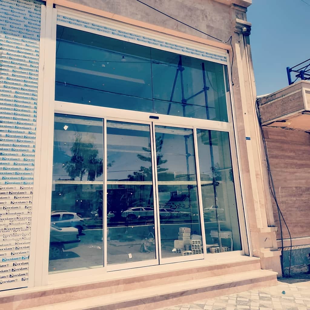 تولید درب اتوماتیک شیشه ای با فریم آلومینیومی