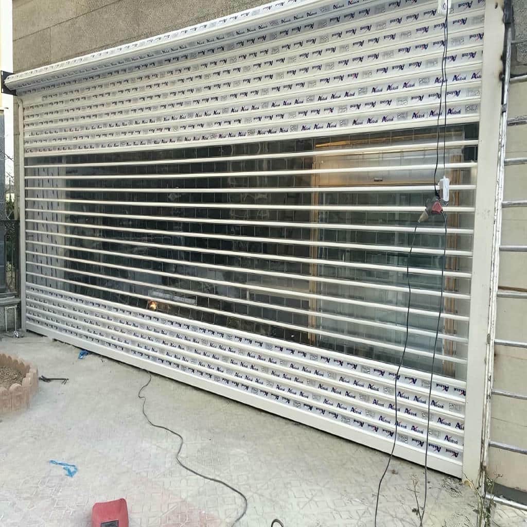 تعمیر درب کرکره ای پارکینگ اتوماتیک و تنظیم موتور