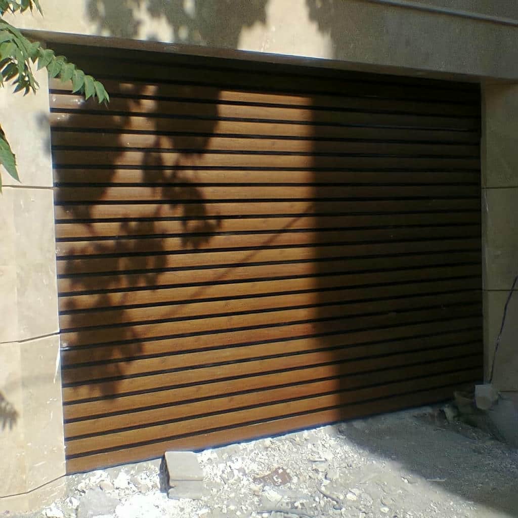 کرکره برقی پارکینگ خودرو با موتور متناسب با تردد