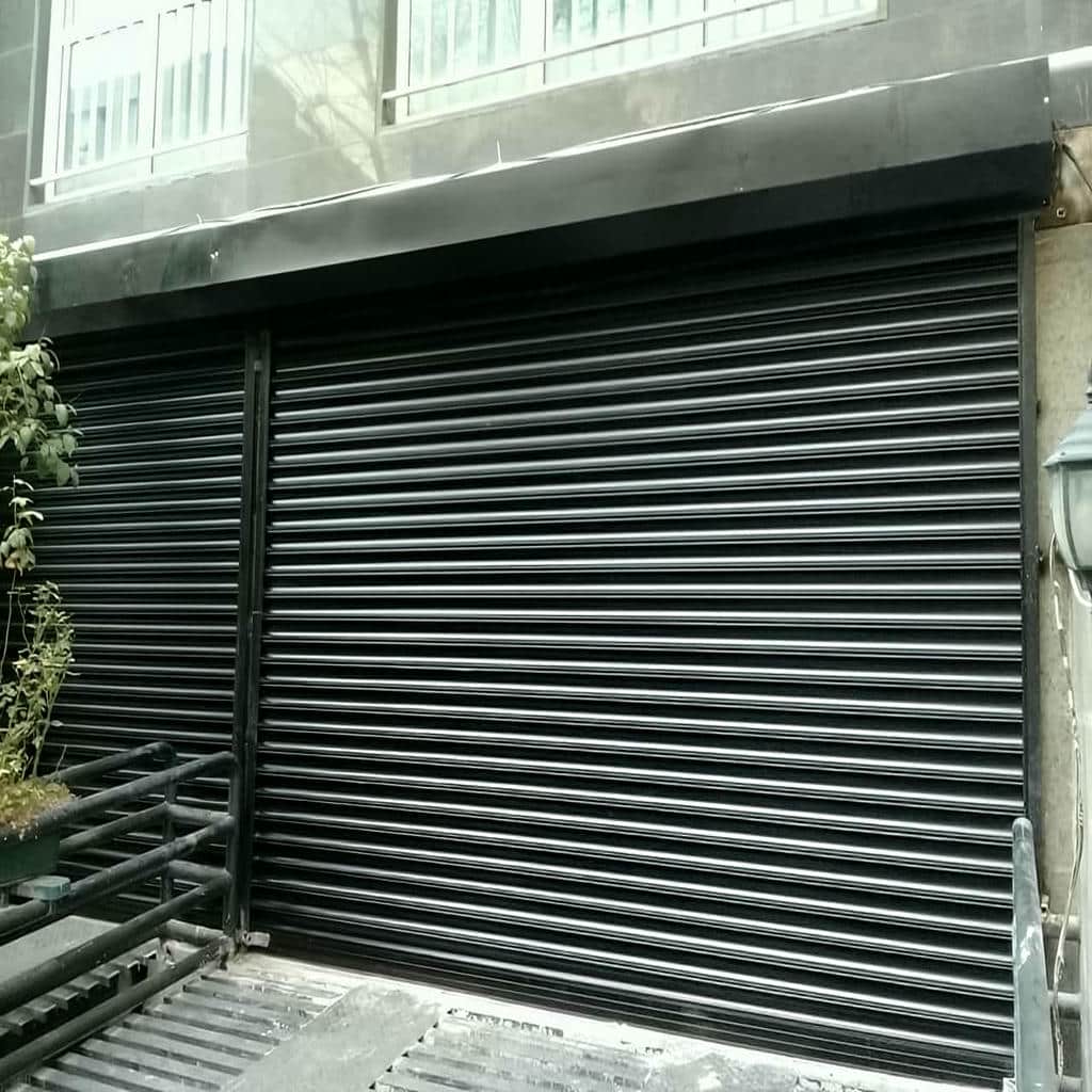 قیمت کرکره برقی رنگی نمای فروشگاه بر اساس مشخصات فنی