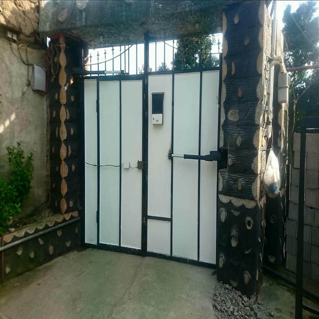 درب پارکینگ بازویی جک دار با مدار فرمان دقیق