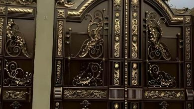 درب پارکینگ لولایی ستون دار با رنگ مشکی مات