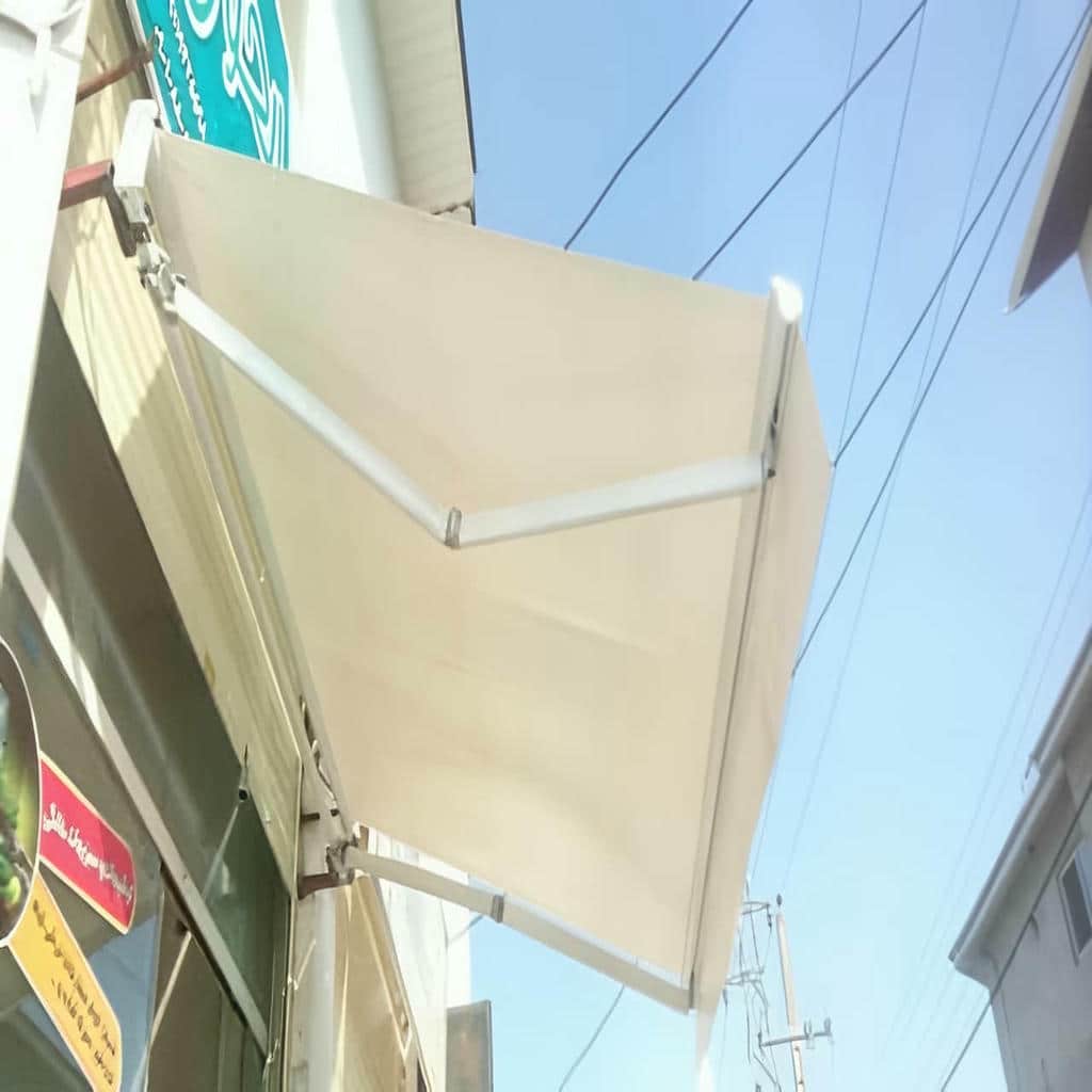 سایبان دوطرفه جمع شده با مسیر عبور آزاد سایبان دوطرفه جمع شده با مسیر عبور آزاد