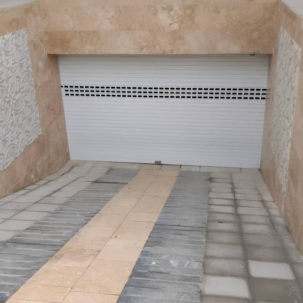 کرکره پارکینگ ریموت دار برای کنترل رفت و آمد ساکنان